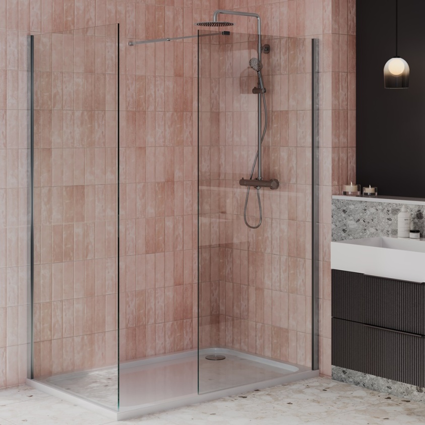 product lifestyle image of 1600mm x 900mm sided chrome walk in shower enclosure with 45mm high shower tray and waste in beige vertical tiled bathroom